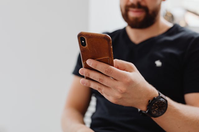 person texting on a cell phone